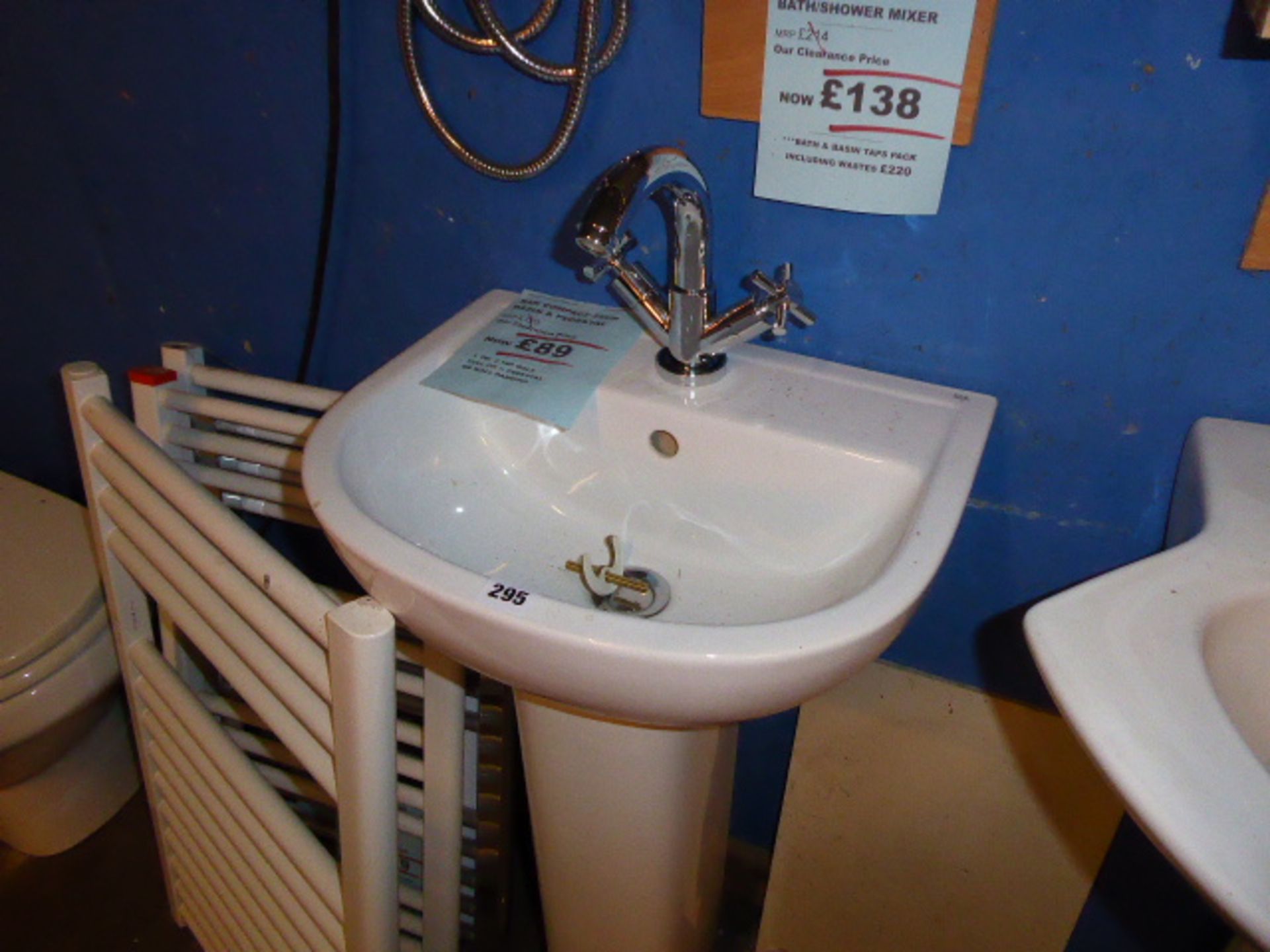 A RAK compact white ceramic wash basin and pedestal with single hole mixer tap