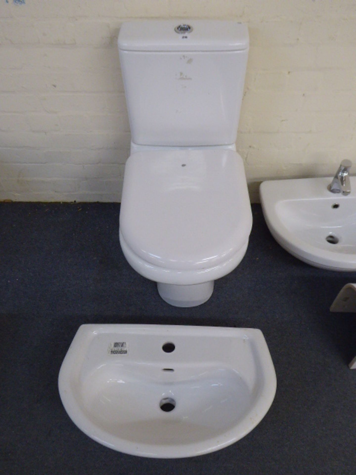 RAK cloakroom suite comprising toilet, cistern and wash hand basin