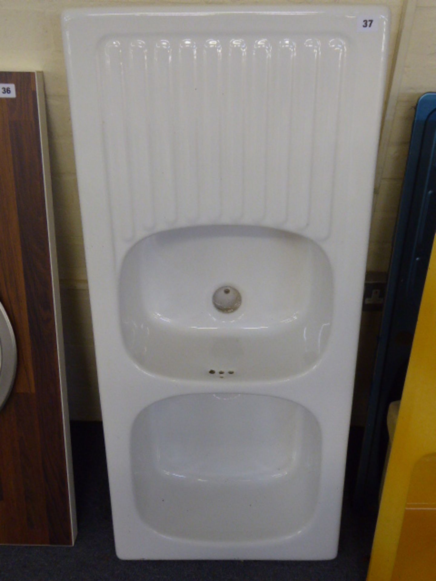 White ceramic 2 bowl kitchen sink unit