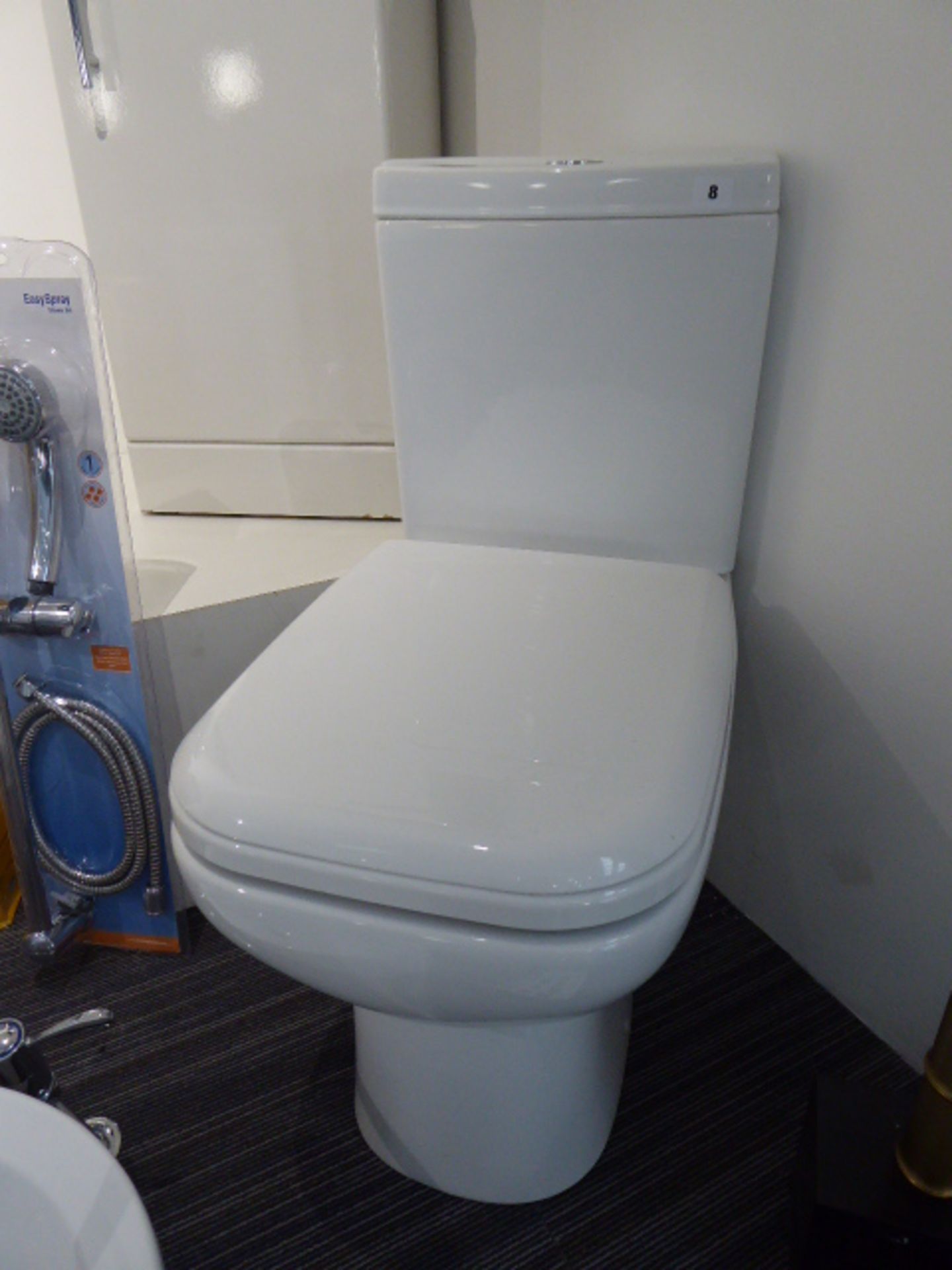 RAK Ceramics corner fitting toilet pan, cistern and seat together with a single drawer vanity