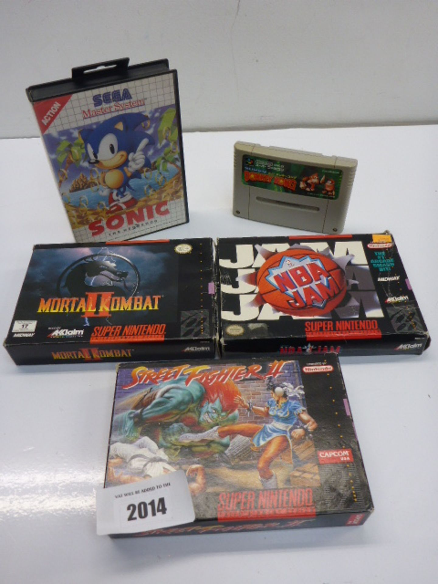 4x Nintendo games and 1 Mega Drive game