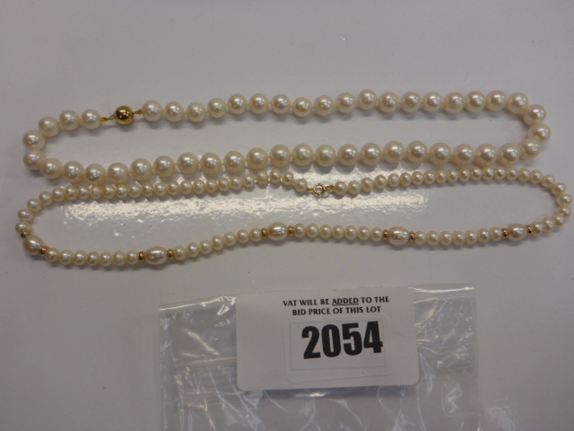 2x peal necklaces; 18ct clasp and 9ct clasp