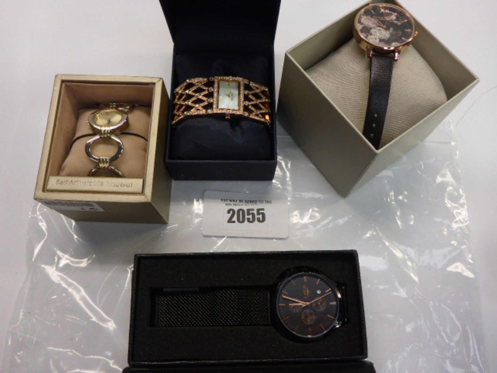 4 boxed wristwatches