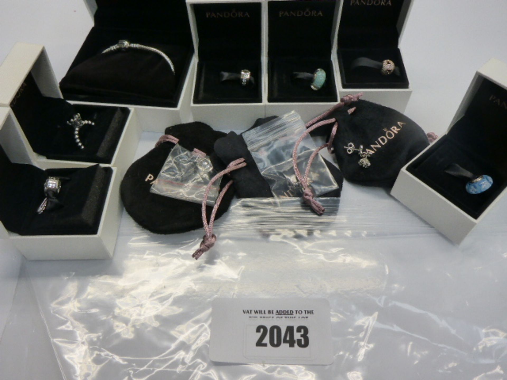 Quantity of Pandora jewellery; 7 charms, ring, pair of earrings and bracelet