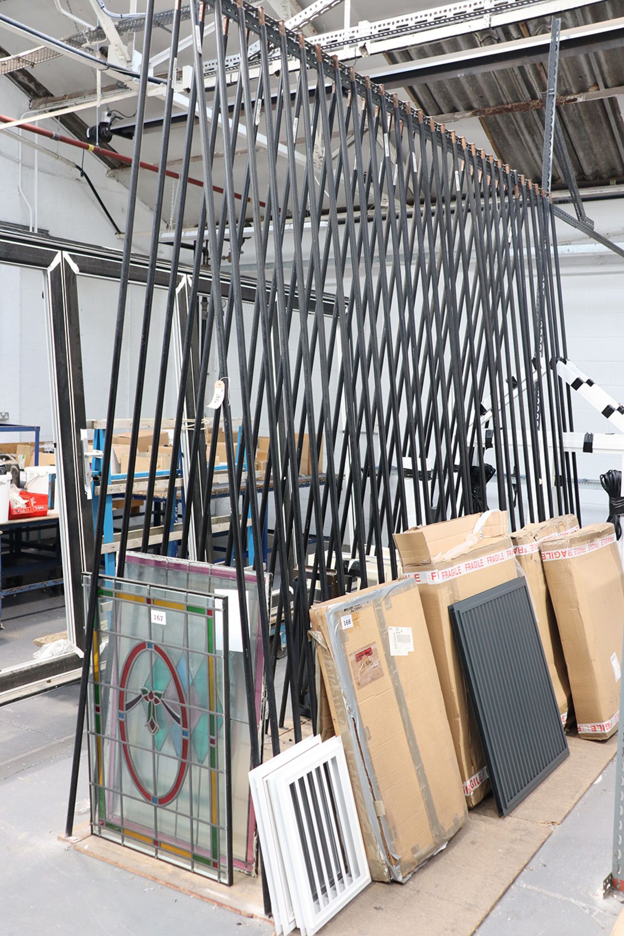 2 bespoke metal angle and alkathene stock racks together with a range of further components