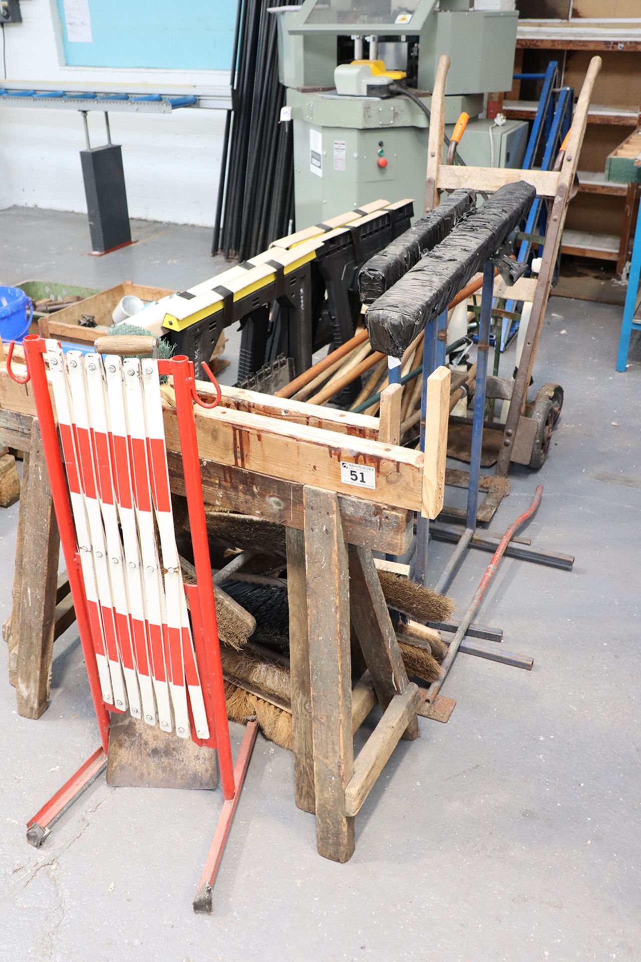 Miscellaneous Stanley plastic workstands, trestles, 2 sack barrows, safety barrier, brooms and