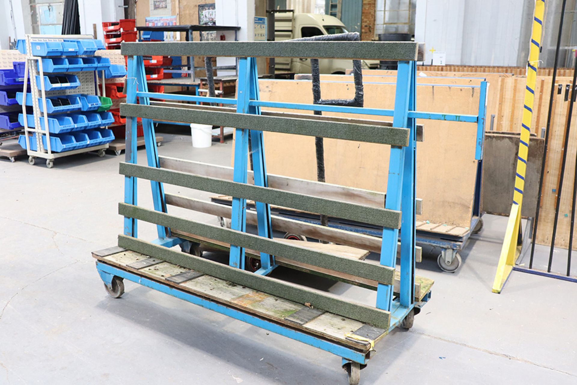 2 welded steel double sided glass racks together with single sided 2 wheel stock carrying trolley