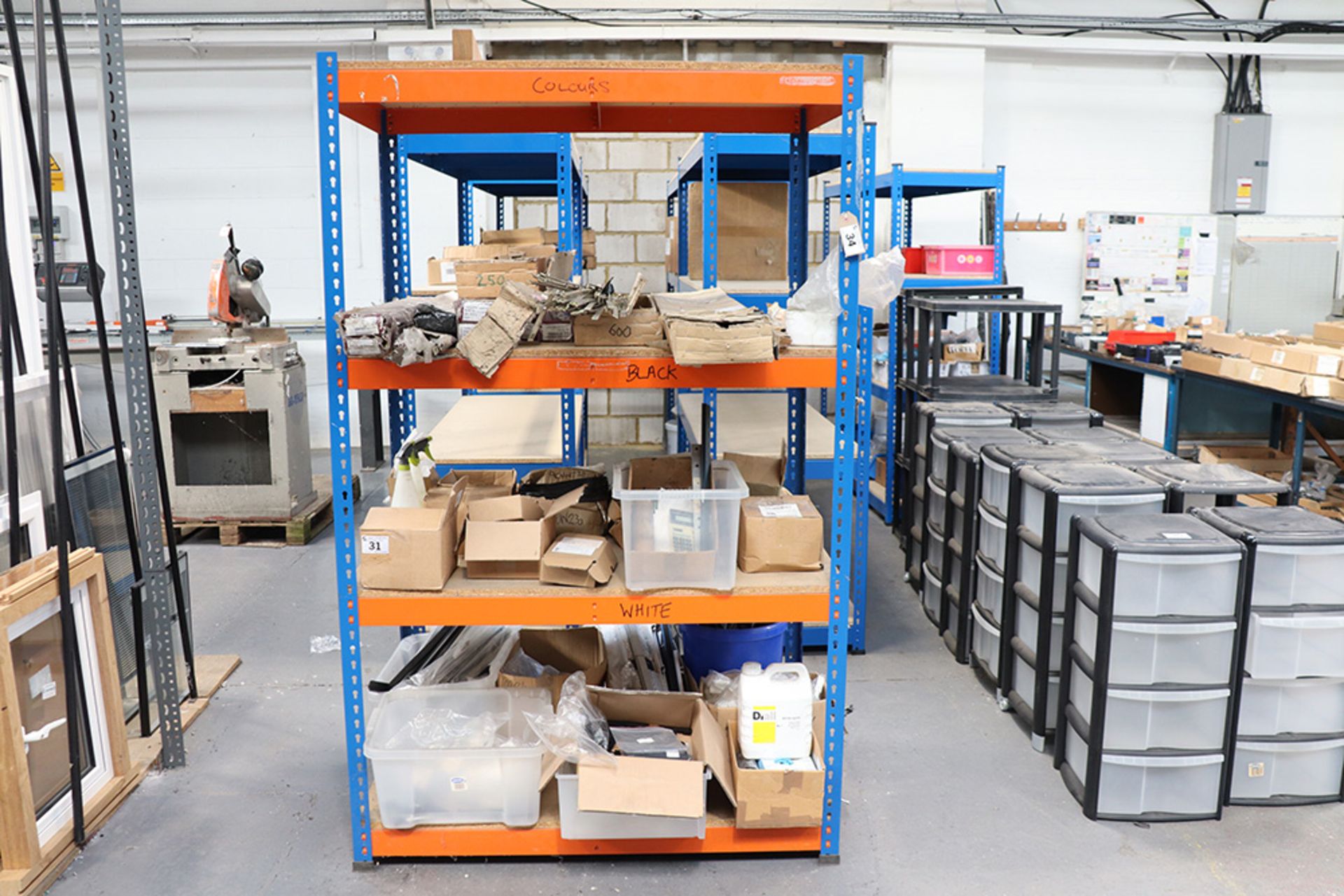 Blue and orange boltless rack of 4 shelves (measures 123cm long x 78cm wide x 2m high)