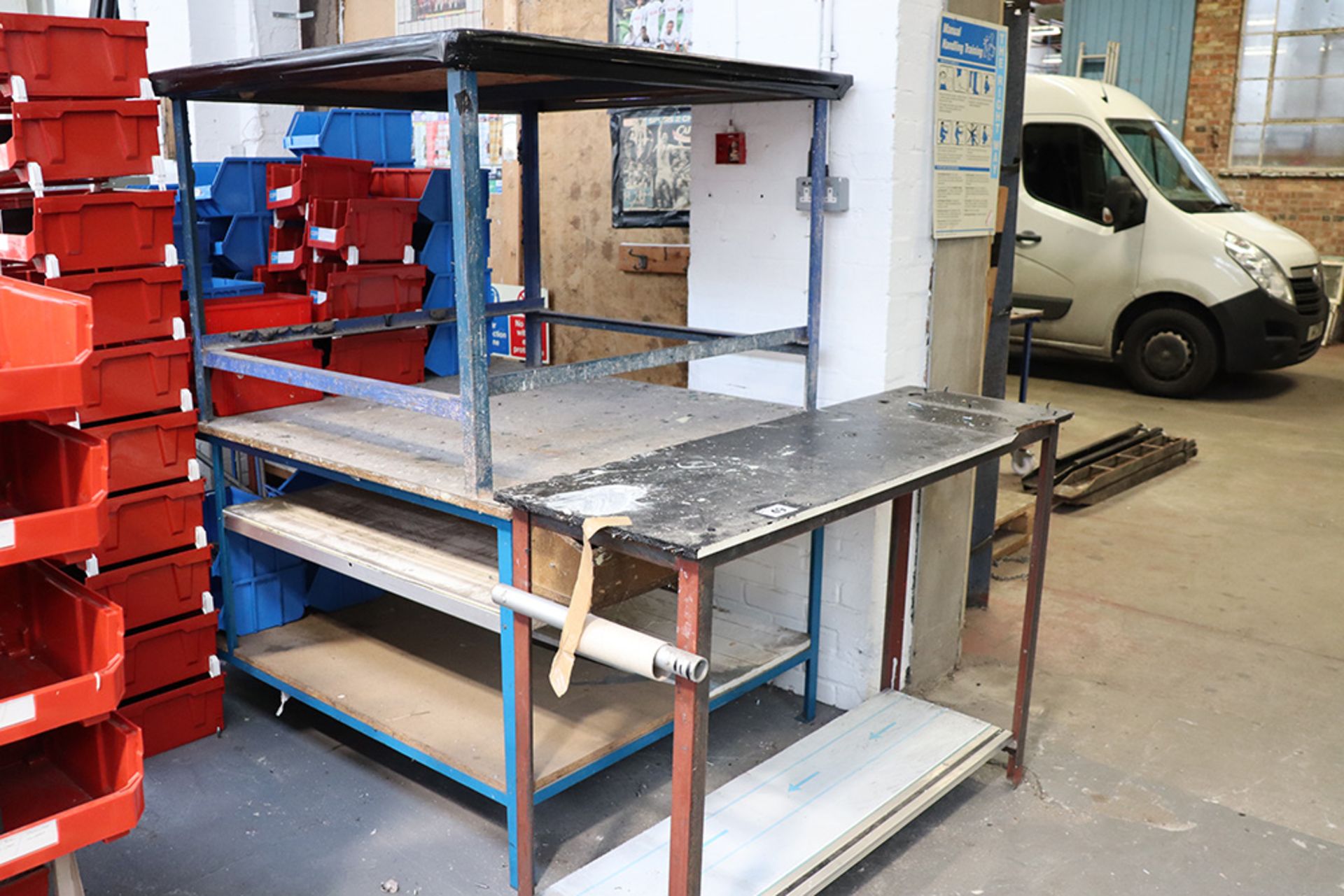 2 welded steel benches and a small table