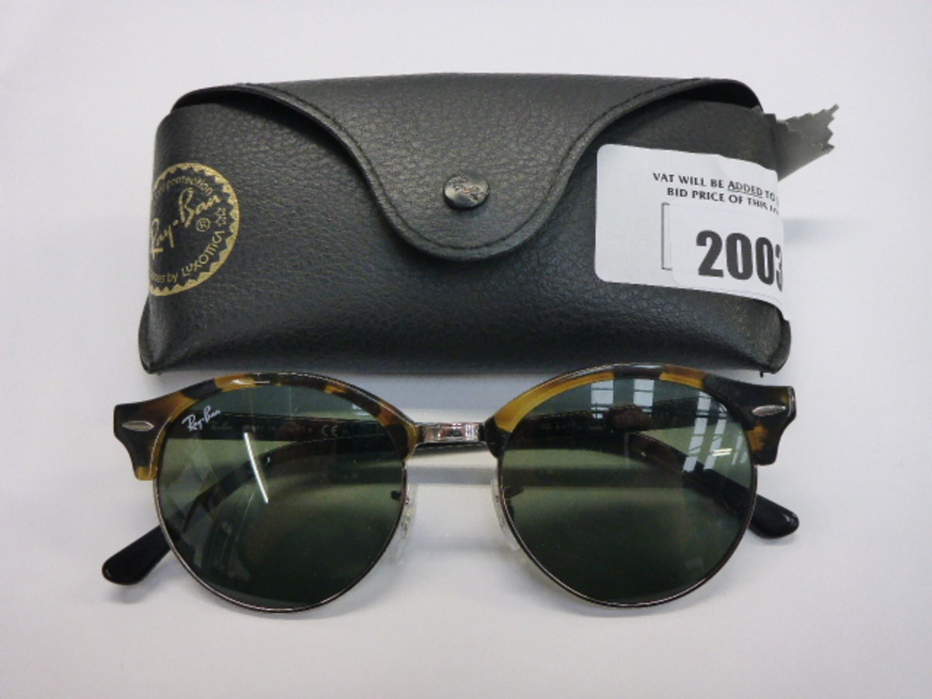Ray-Ban RB-1157 sunglasses with hard case