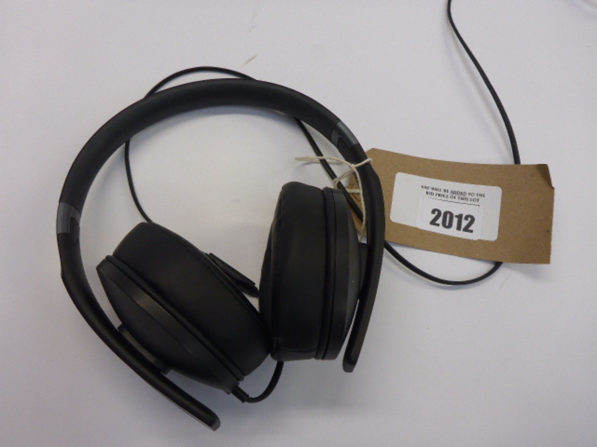 Sennheiser HD4.20s headphones.