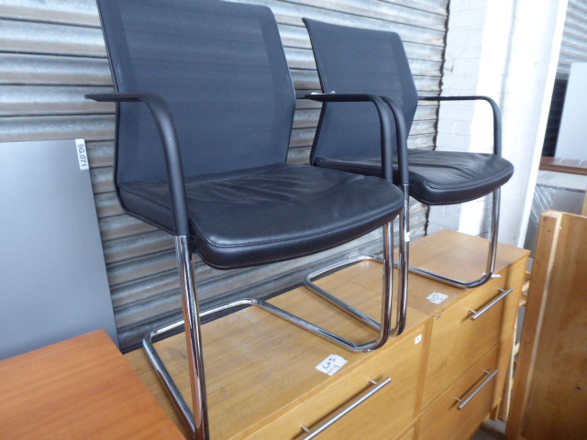 2 Orangebox black leather and mesh canterlever chairs