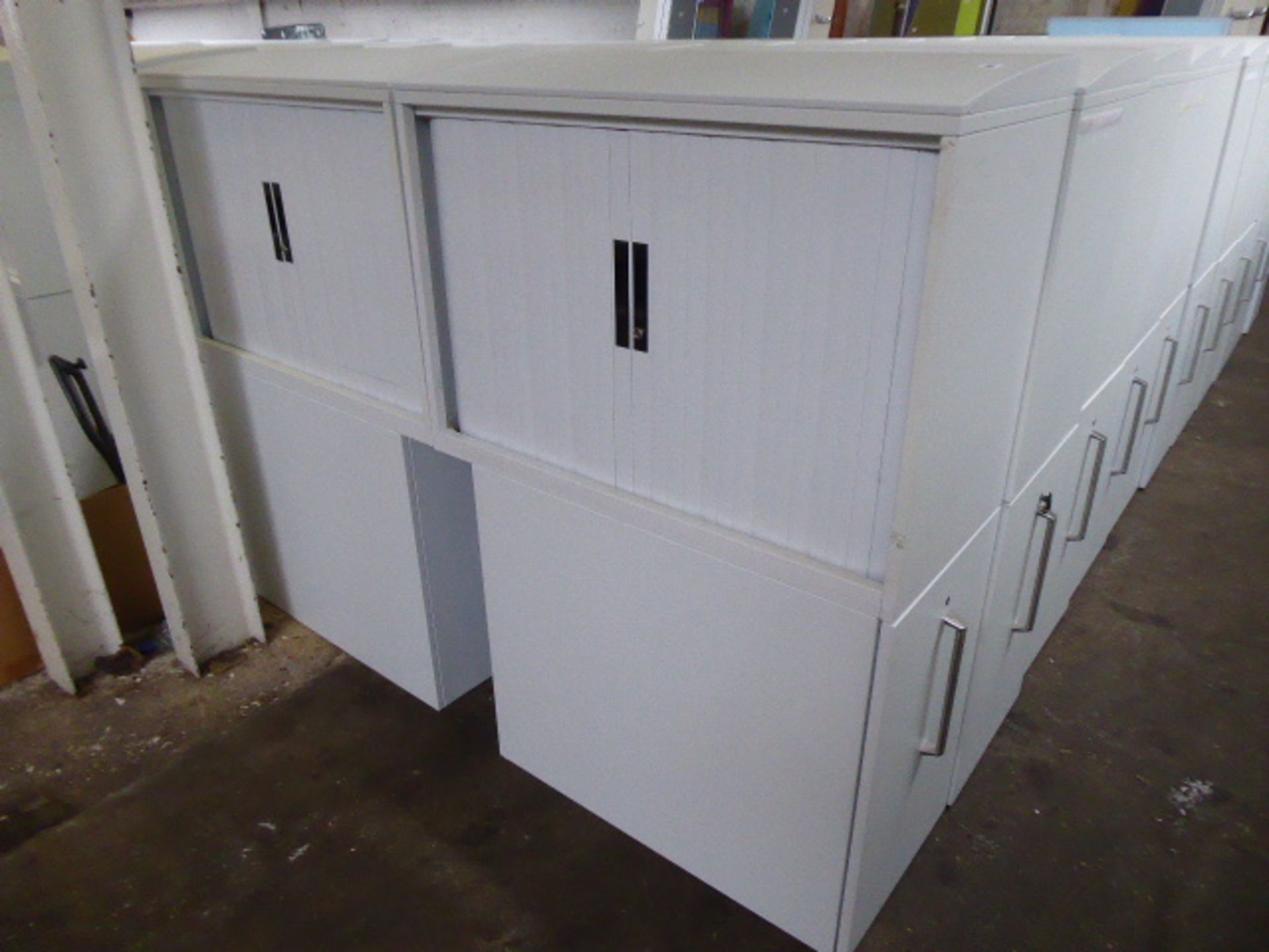 4 workstation storage units in grey with a single tambour top cabinet 90cm wide and a heavy secure