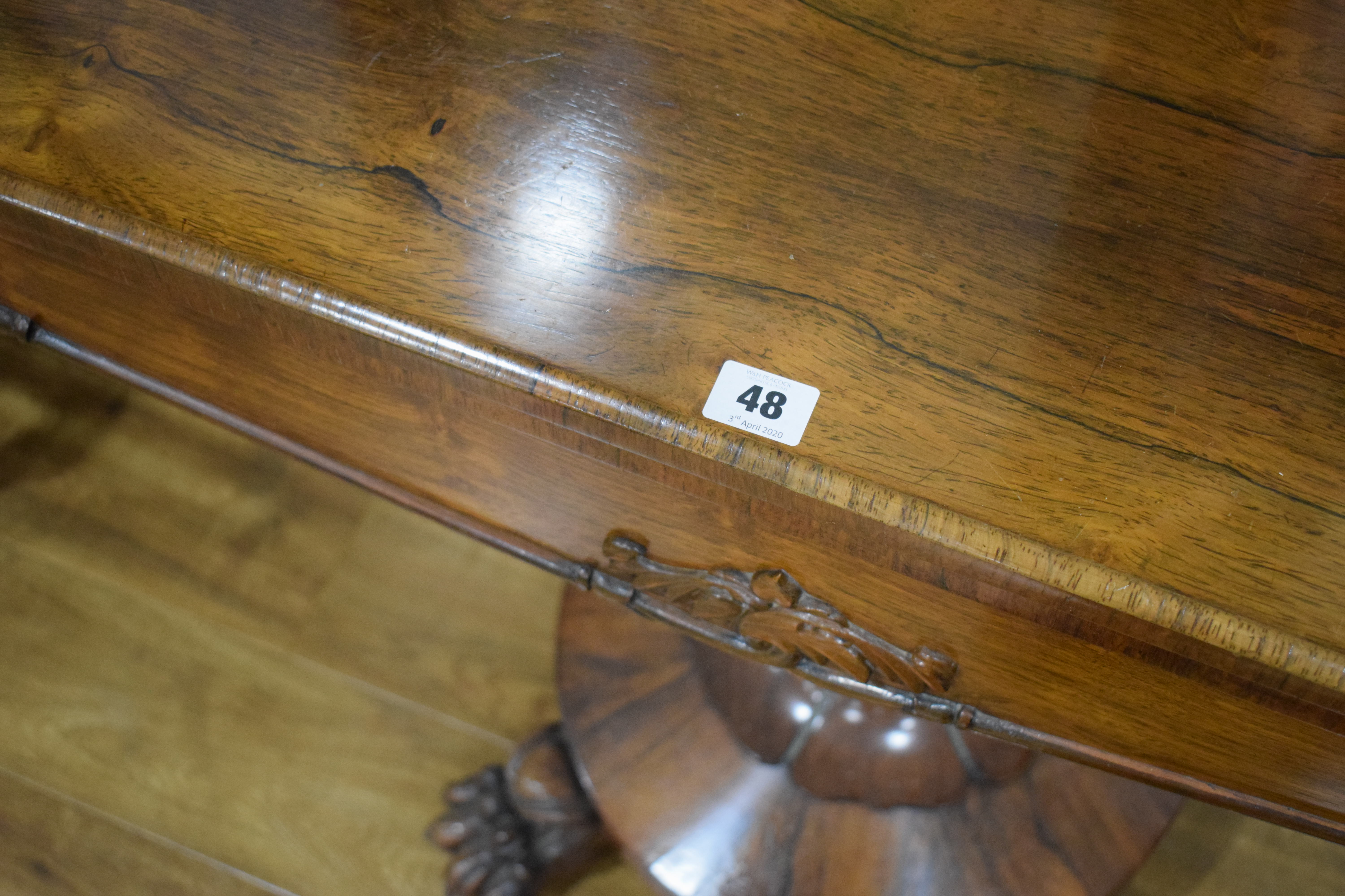 A Regency rosewood card table, the rectangular surface above a tapered stand on four claw feet, w. - Image 9 of 10