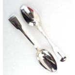 A pair of William IV silver fiddle pattern table spoons, maker RH, London 1832,