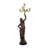 An early 20th century bronze and gilt metal candelabrum modelled as a robed lady wearing pearls, h.