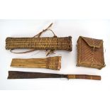 A Burmese knife with a bamboo and rattan bound handle,