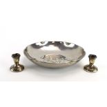 A Keswick Staybrite hammered shallow bowl of circular form centrally decorated with a stylised