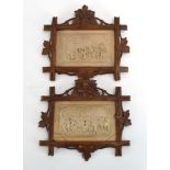 A pair of Continental carved hardstone plaques,