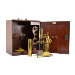 A 19th century brass microscope,