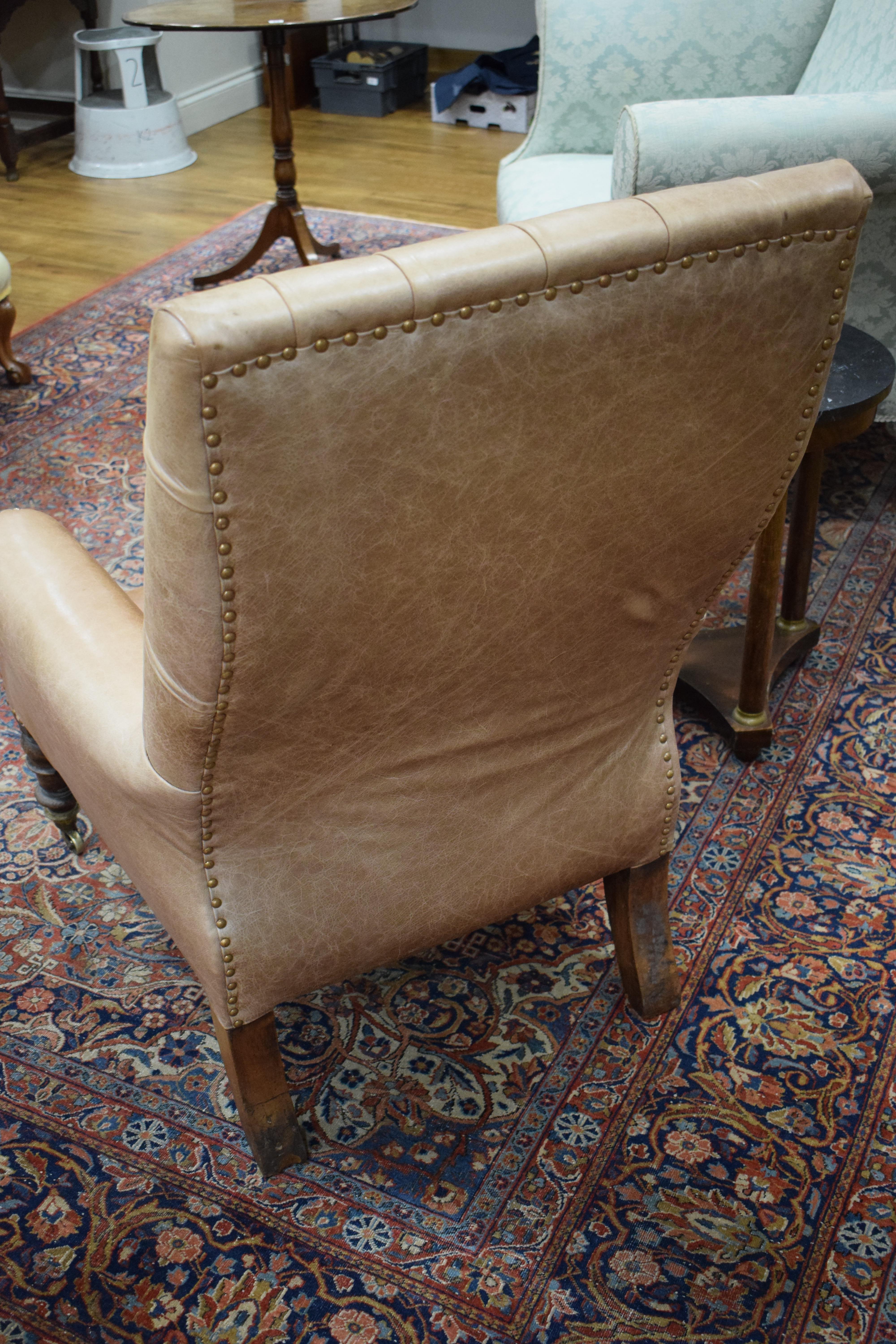 A 19th century walnut framed buttoned pale brown leather library chair with acanthus leaf - Image 3 of 20