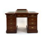 An early 20th century mahogany twin pedestal desk,