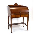 An early 20th century mahogany, strung and crossbanded writing desk,