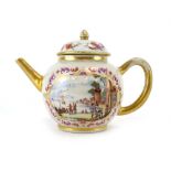 A late 18th/early 19th century teapot of spherical form decorated with harbour scenes,