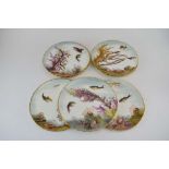 A set of nine porcelain cabinet plates, each decorated with a nautilus scene, d.