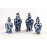 Four Chinese blue and white jars and covers, each decorated with dragons and foliate motifs, max h.