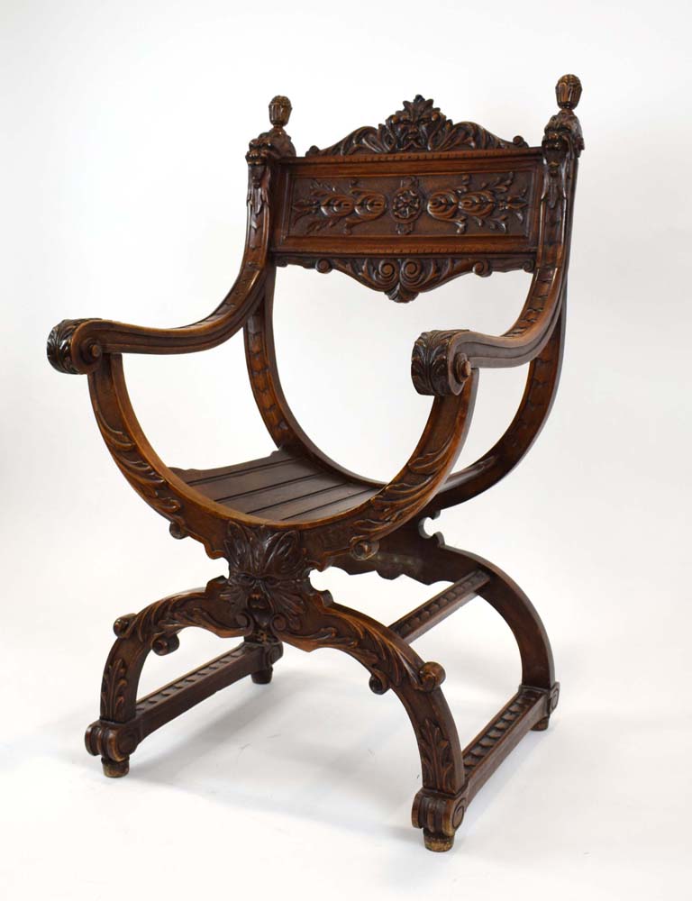 A continental walnut throne-type chair carved with stylised figures and foliate motifs, h. - Image 2 of 12