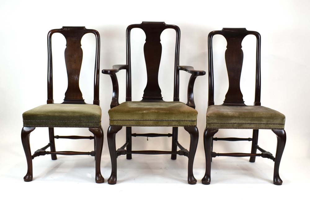 A set of six 19th century dark stained walnut Queen Anne-style dining chairs with turned stretchers