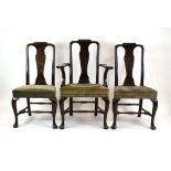 A set of six 19th century dark stained walnut Queen Anne-style dining chairs with turned stretchers