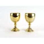 A pair of silver gilt goblets of typical form, maker JHO, London 1970, h. 11.