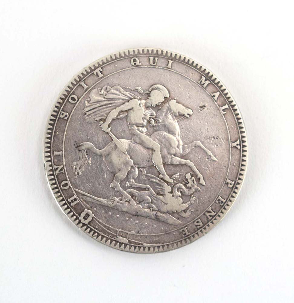 A George III silver crown, 1819, Laureate head right,