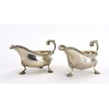 A pair of early 20th century silver sauce boats of typical form,