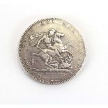 A George III silver crown, 1818, Laureate head right,