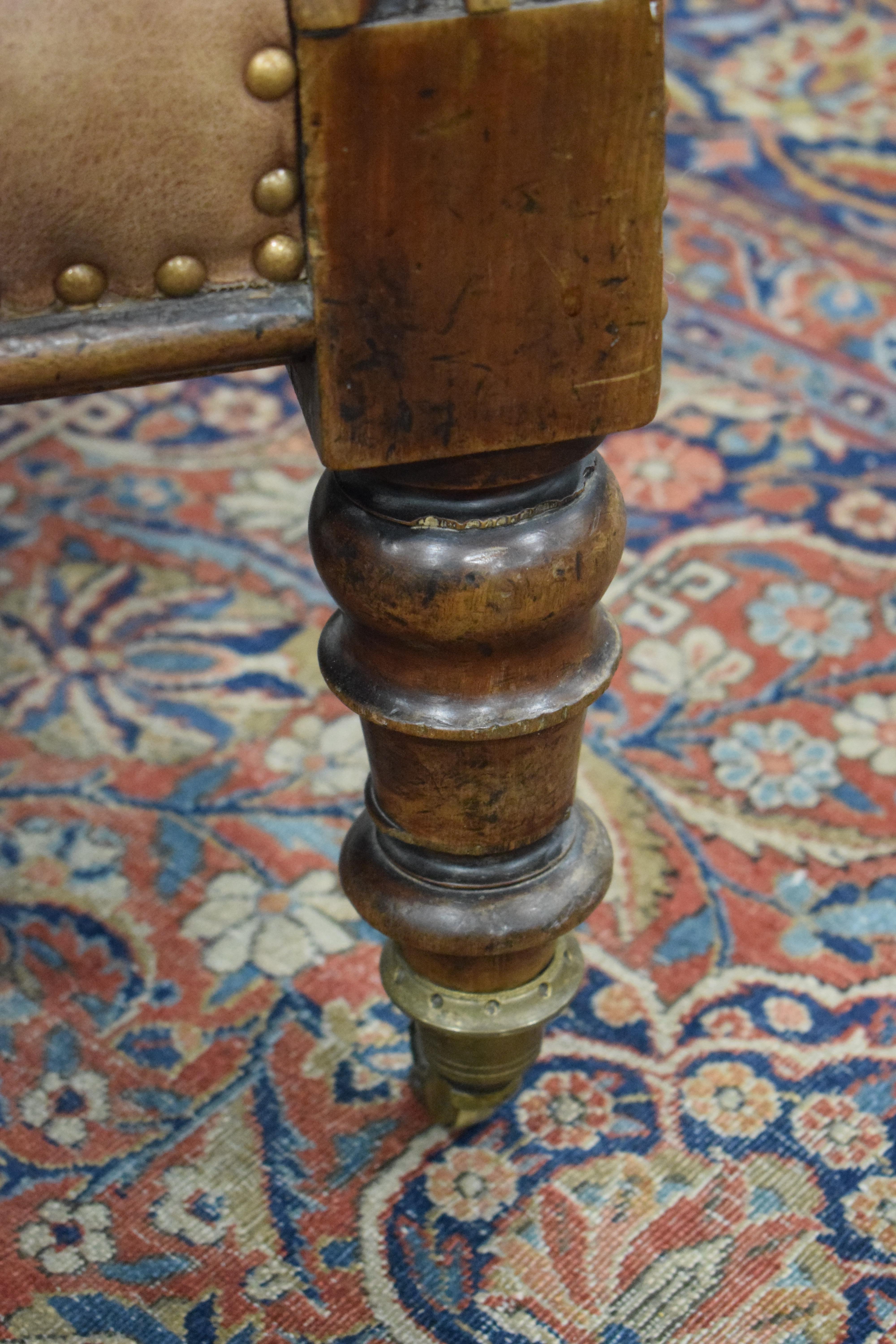 A 19th century walnut framed buttoned pale brown leather library chair with acanthus leaf - Image 6 of 20