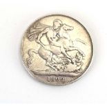 A George IV silver crown, 1822, Laureate head right, George slaying the dragon,
