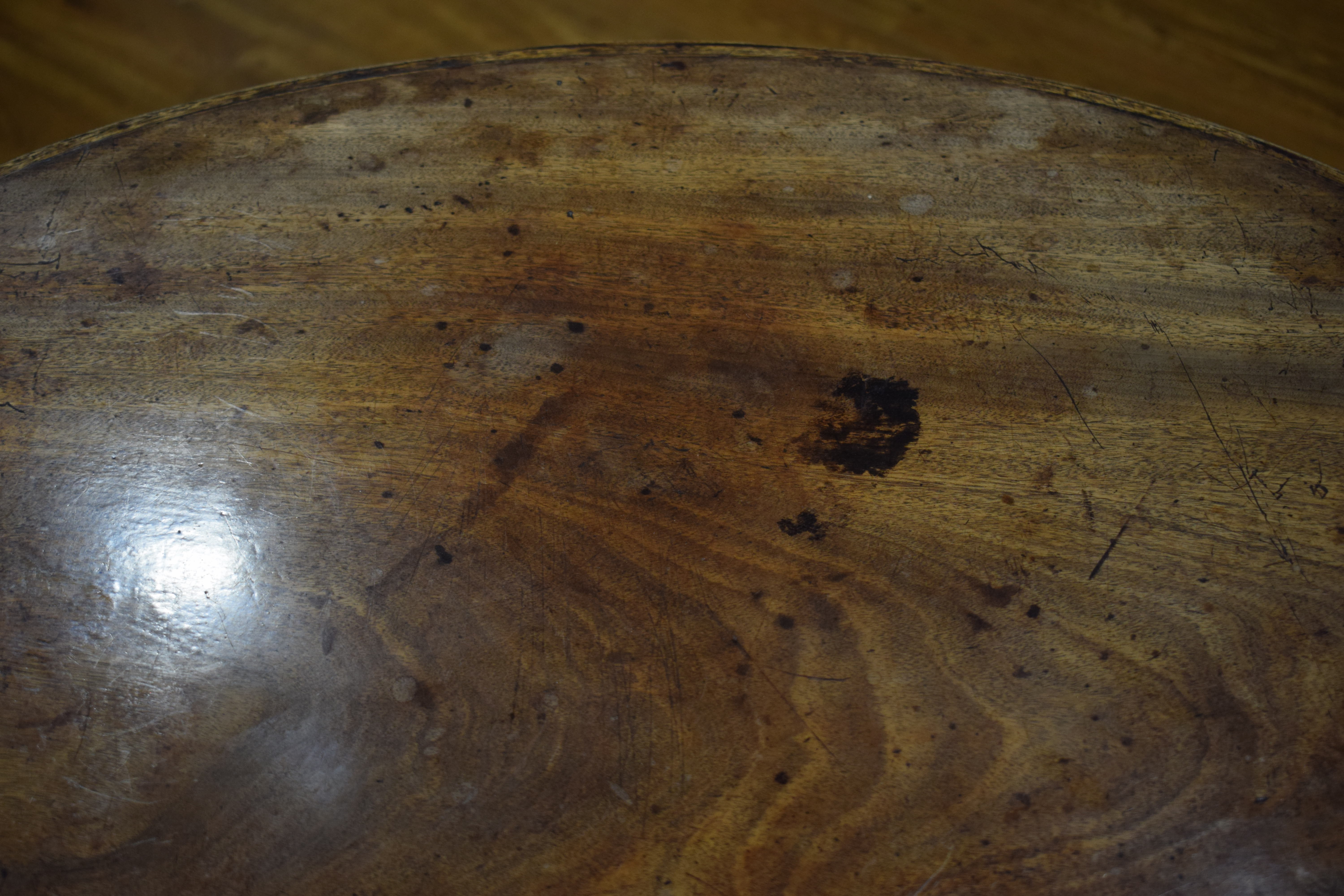 A 19th century mahogany tripod wine table with oval surface on a fixed base, w. 71. - Image 7 of 10