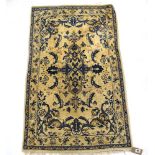 A Tabriz rug, the cream field with all-over pale blue foliate motifs,