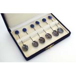 A cased set of six Southern American metalware teaspoons with lapis lazuli finial's