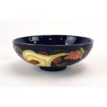 A Moorcroft Queens Choice pattern shallow dish of circular form, d. 11.