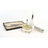 A mixed parcel of silver comprising a butter dish, a dressing table container,