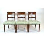 A set of six Victorian mahogany and brass inlaid bar back dining chairs with shell design