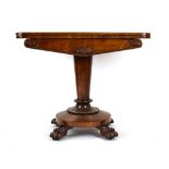 A Regency rosewood card table, the rectangular surface above a tapered stand on four claw feet, w.
