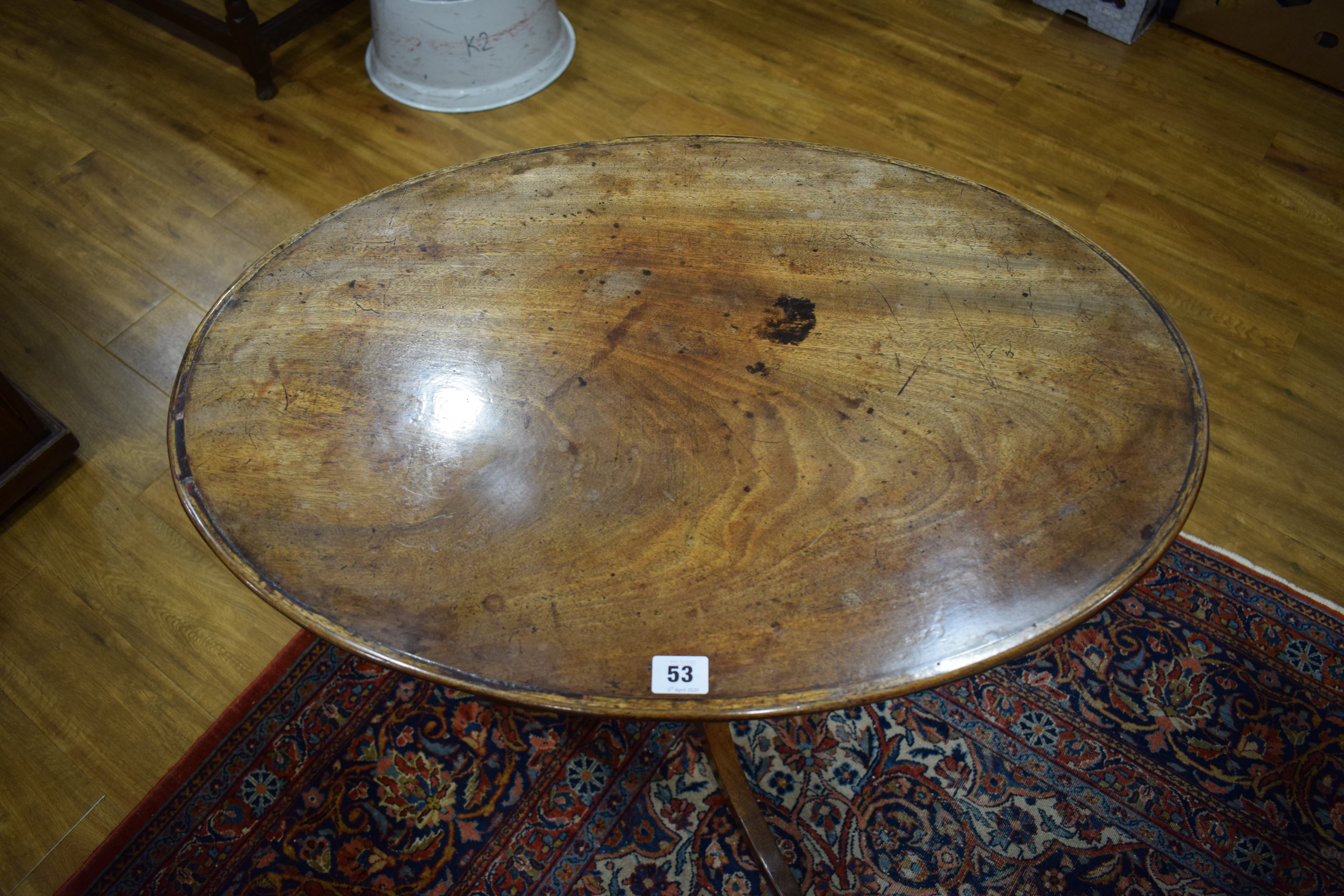 A 19th century mahogany tripod wine table with oval surface on a fixed base, w. 71. - Image 8 of 10