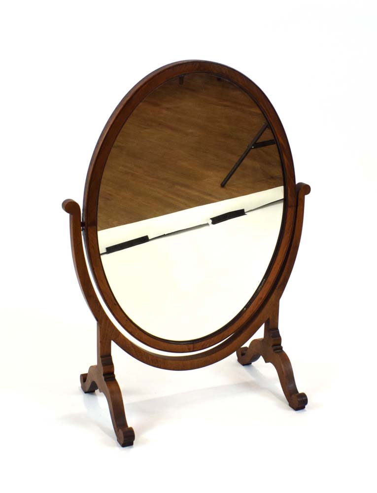 A 19th century mahogany framed hinged dressing table mirror of oval form, h.