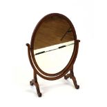 A 19th century mahogany framed hinged dressing table mirror of oval form, h.