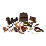 A collection of smoking related items including a six-pipe rack, various cased meerschaum,